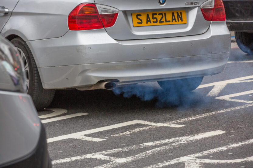 exhaust of a car with fumes coming out