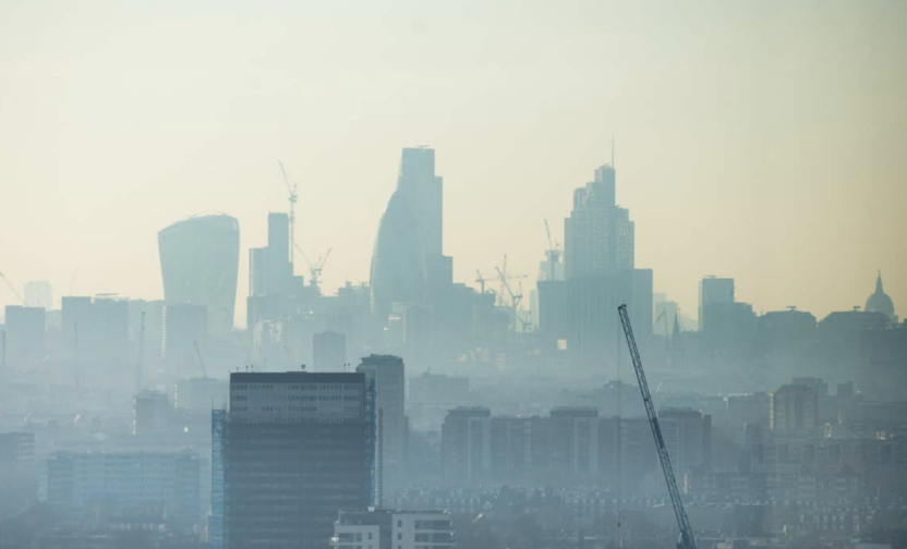London skyline with skyscrapers shrouded in fog