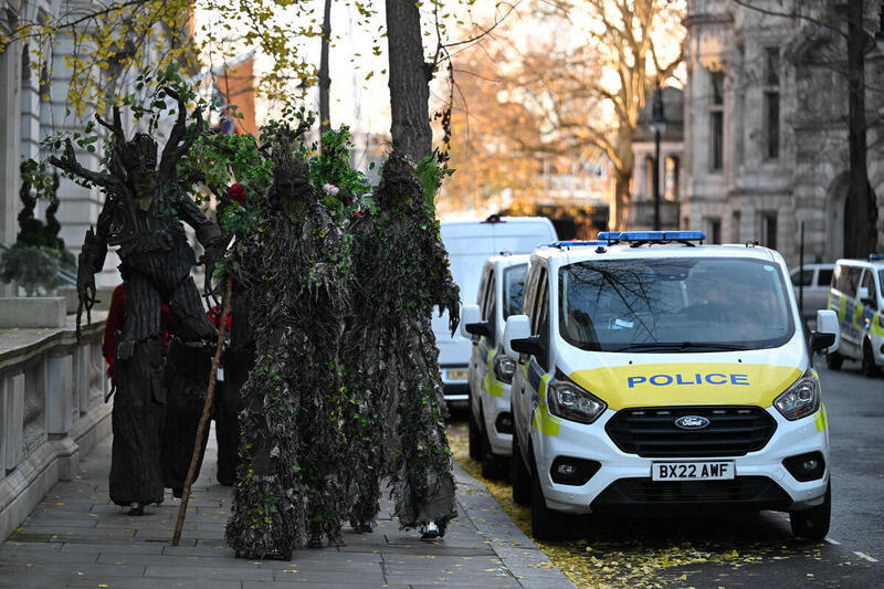 Carollers, Ents and a coalition of green groups protest subsidies for burning ‘Christmas’ trees